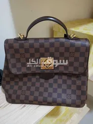 مرحبا شنطه الفي شبه جديده مره وحده استعمال